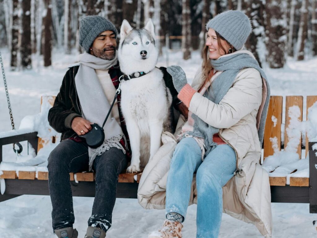 couple enjoying with their dog
