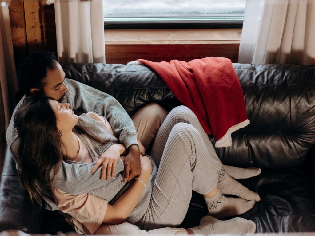 couple cozy in a sofa