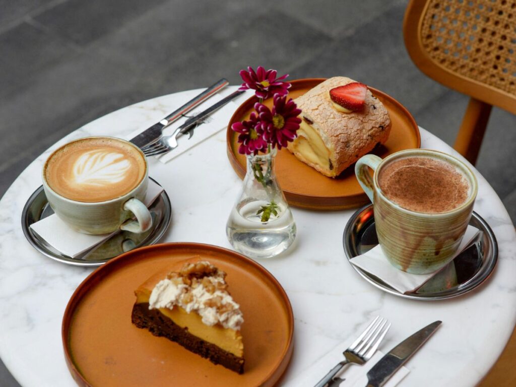 desserts served with coffee on table