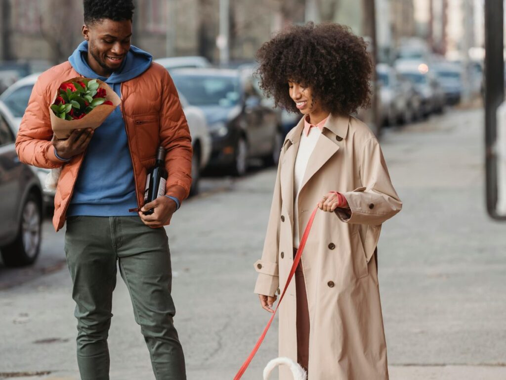 couple walking with the pet