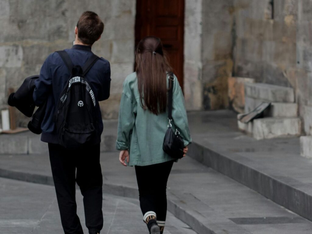 couple walking on historical sites