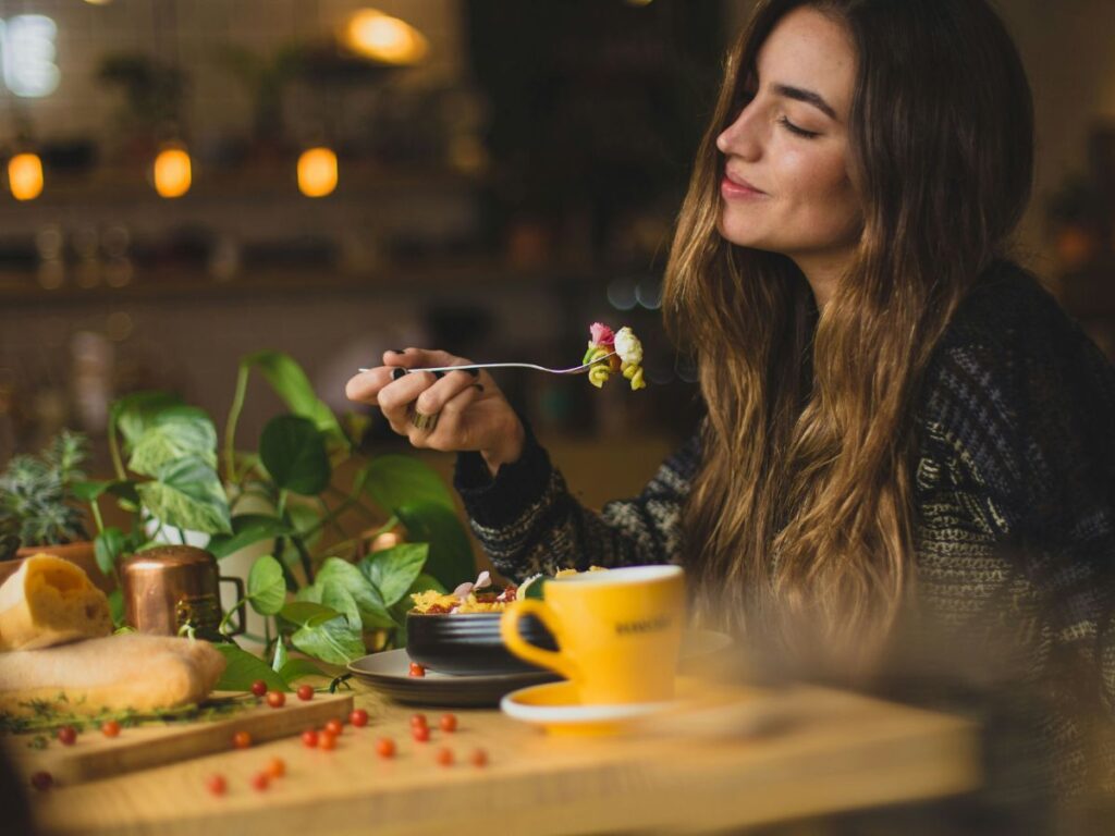 woman enjoying her coffee and dessert