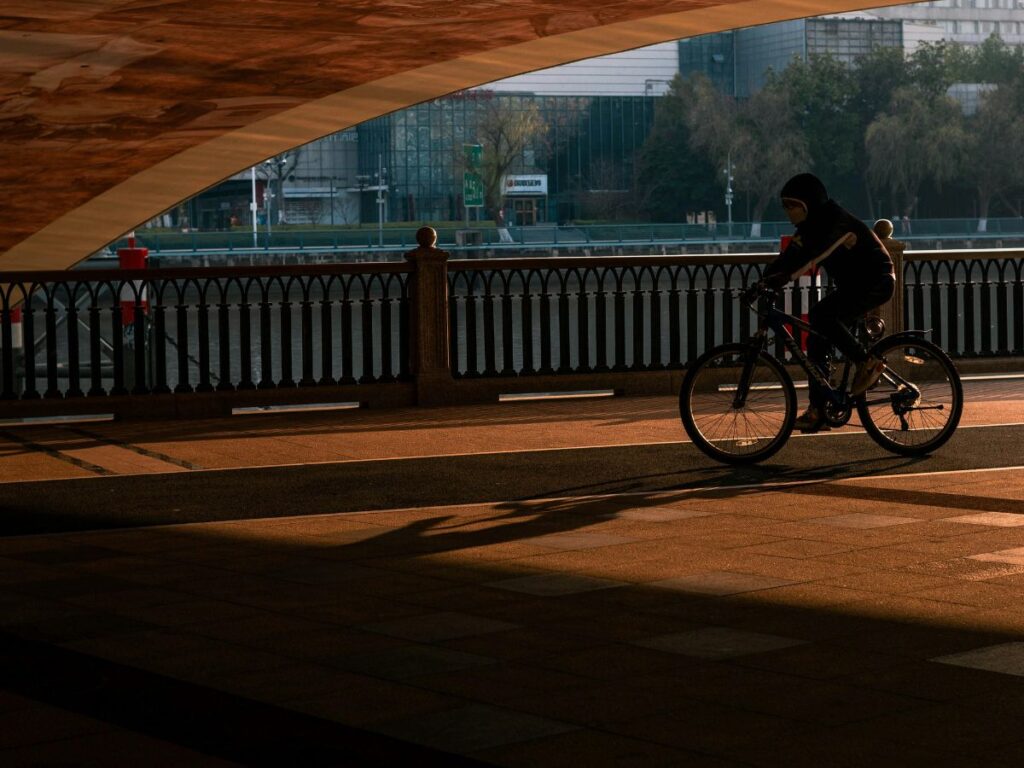 man riding bike