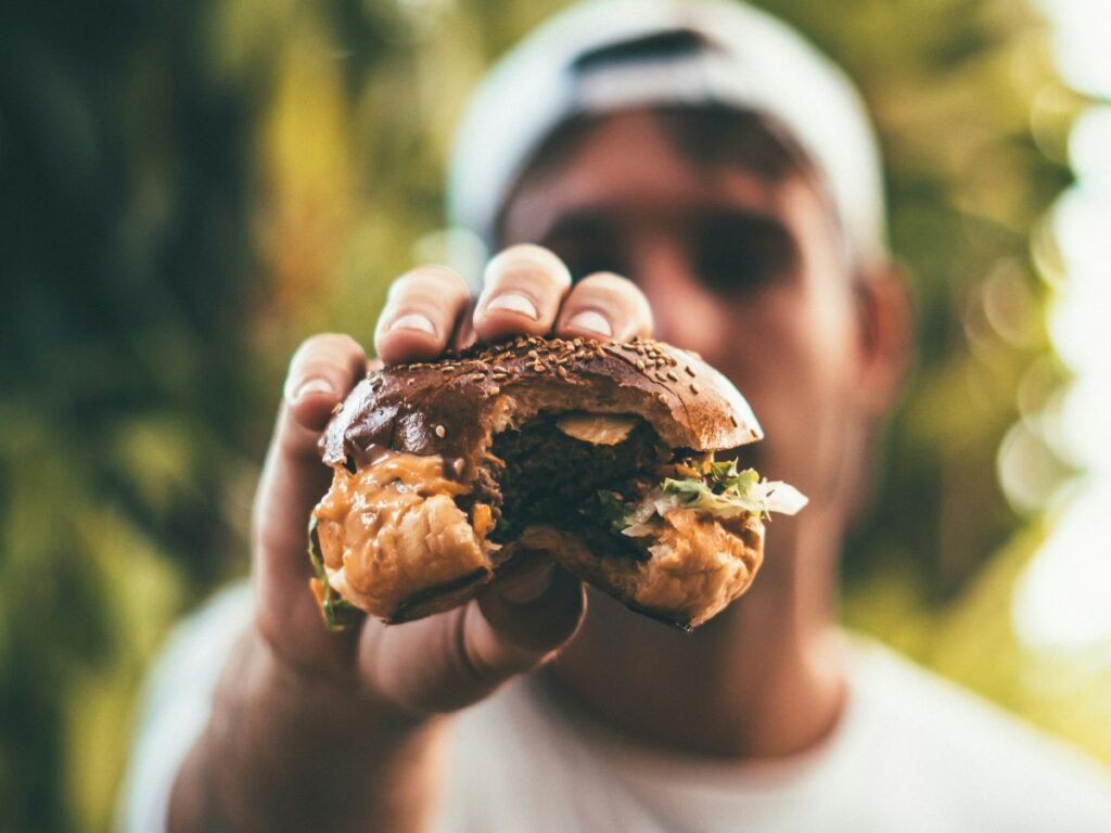 man showing burger