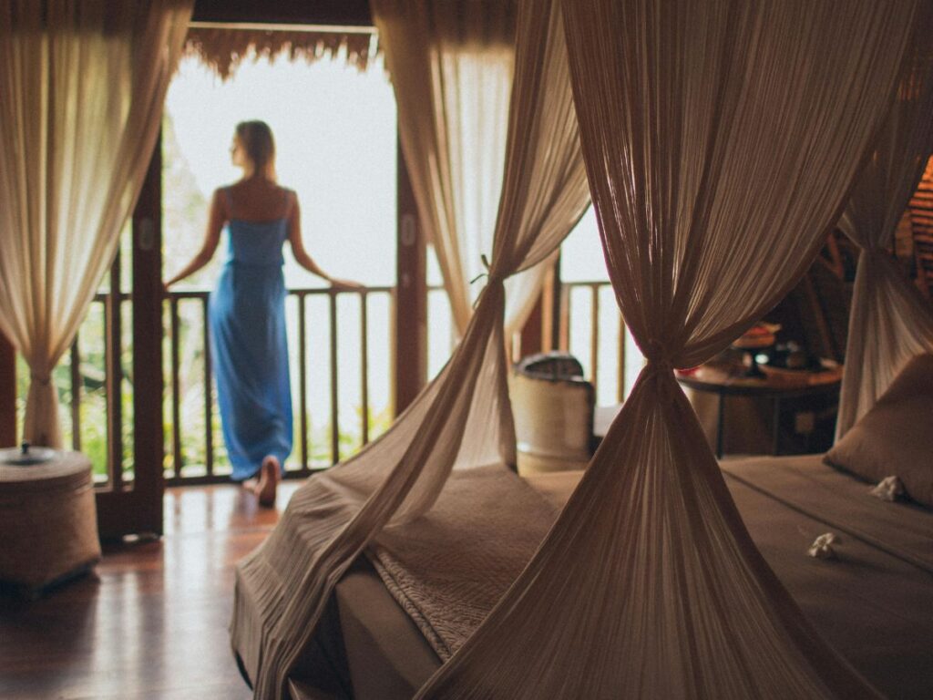 woman standing in hotel balcony