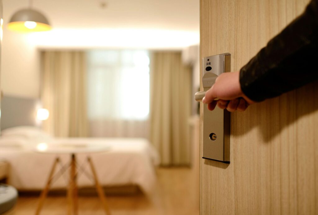 opening the door of hotel room