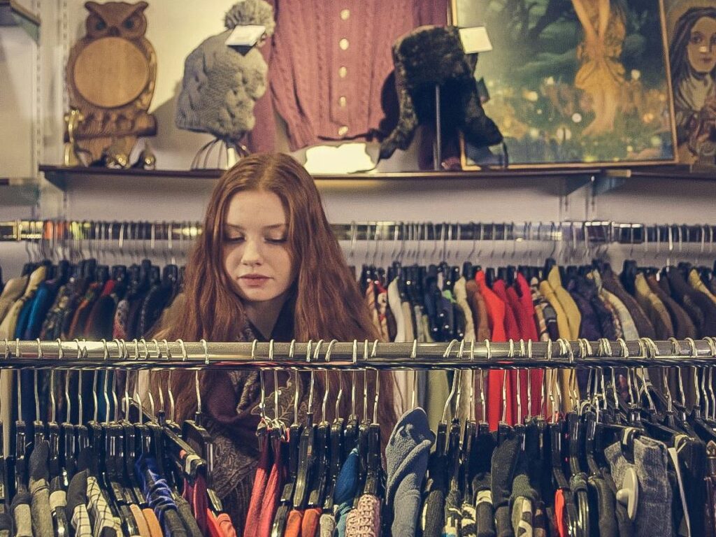 girl finding clothes in a shop