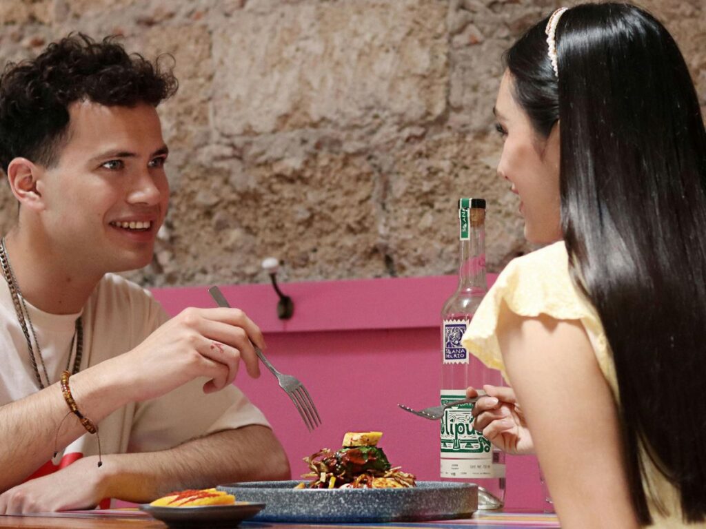 couple having food in a cheap restaurant