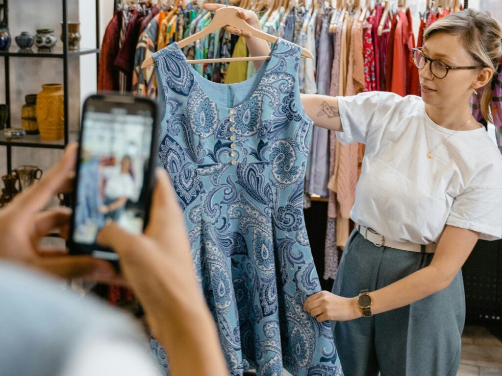 taking picture of a dress in a shop