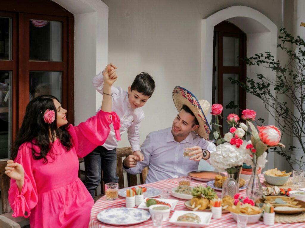 family celebrating birthday in a restaurant