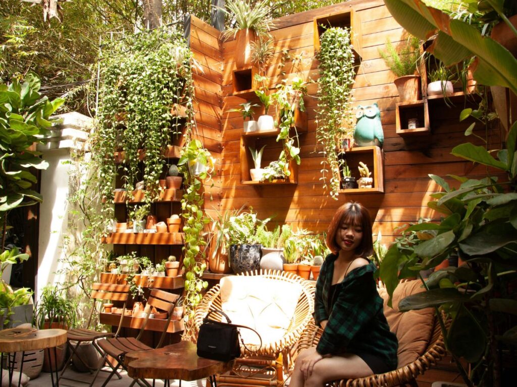 girl getting her photo clicked in a beautiful spot of restaurant