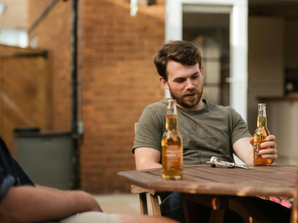 man drinking beer