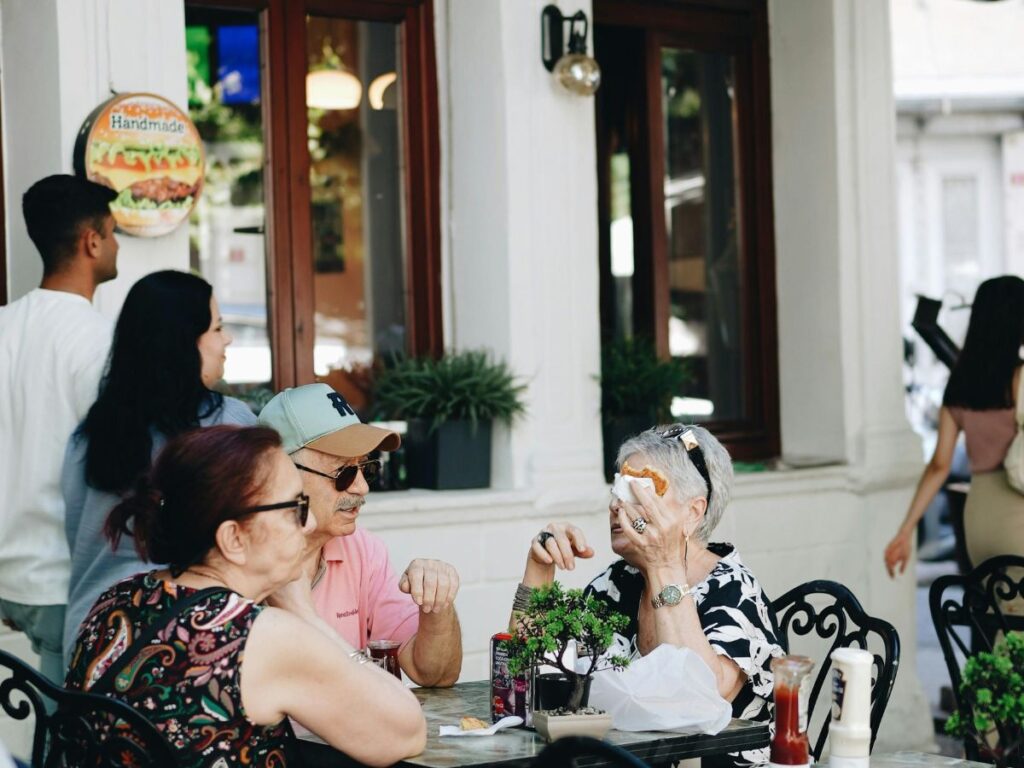 people eating food in a patio