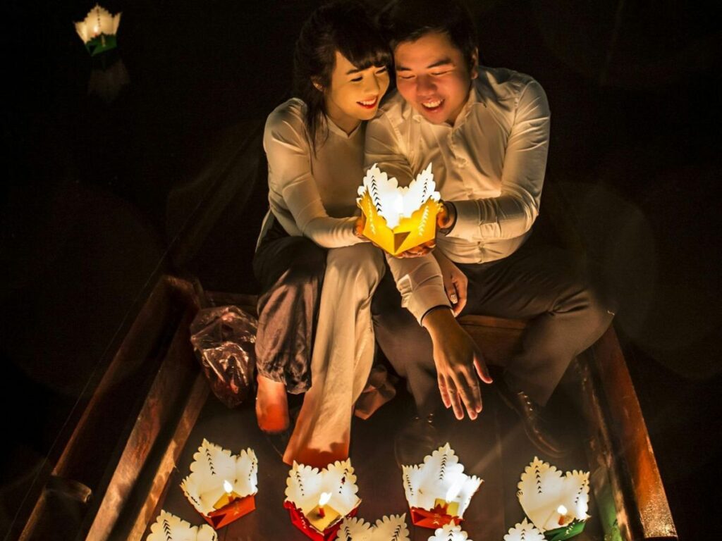 couple lighting lanterns