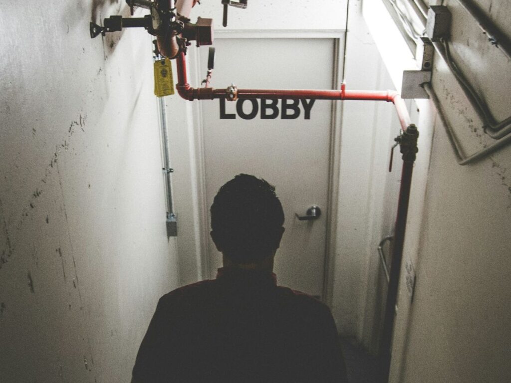 man entering lobby of an escape room