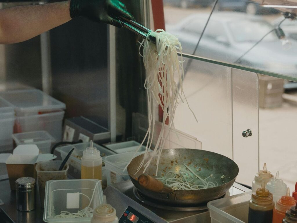 chef cooking noodles