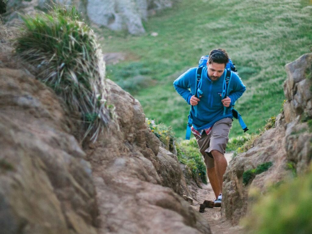 man hiking on a mountain