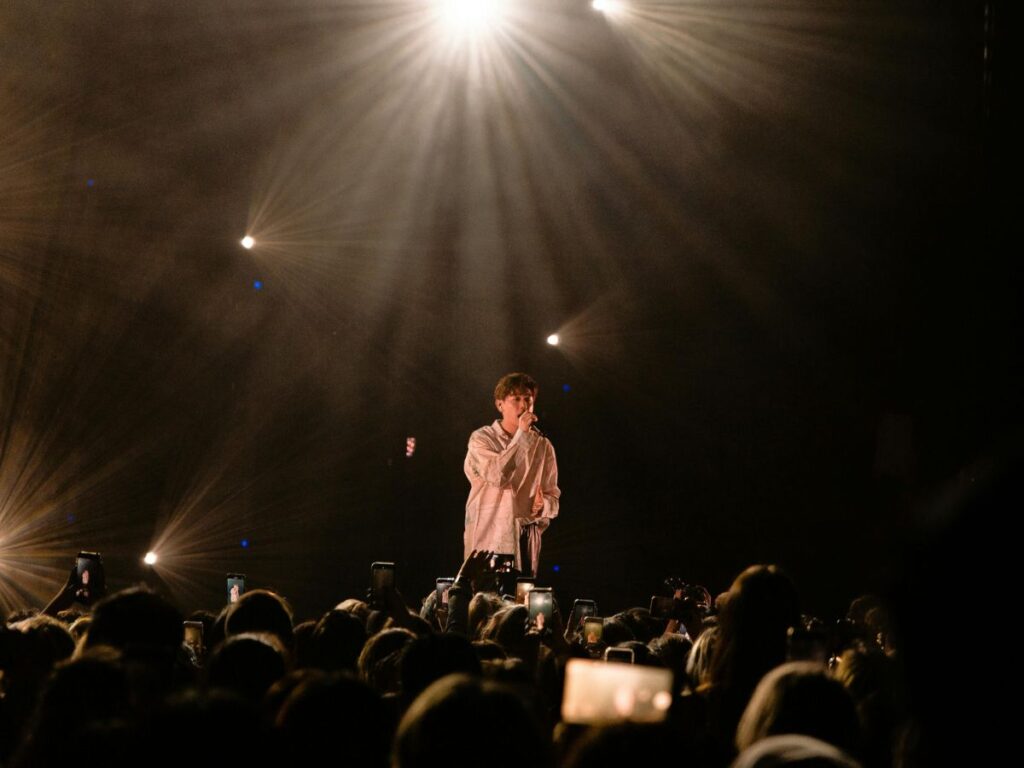 singer singing at a concert