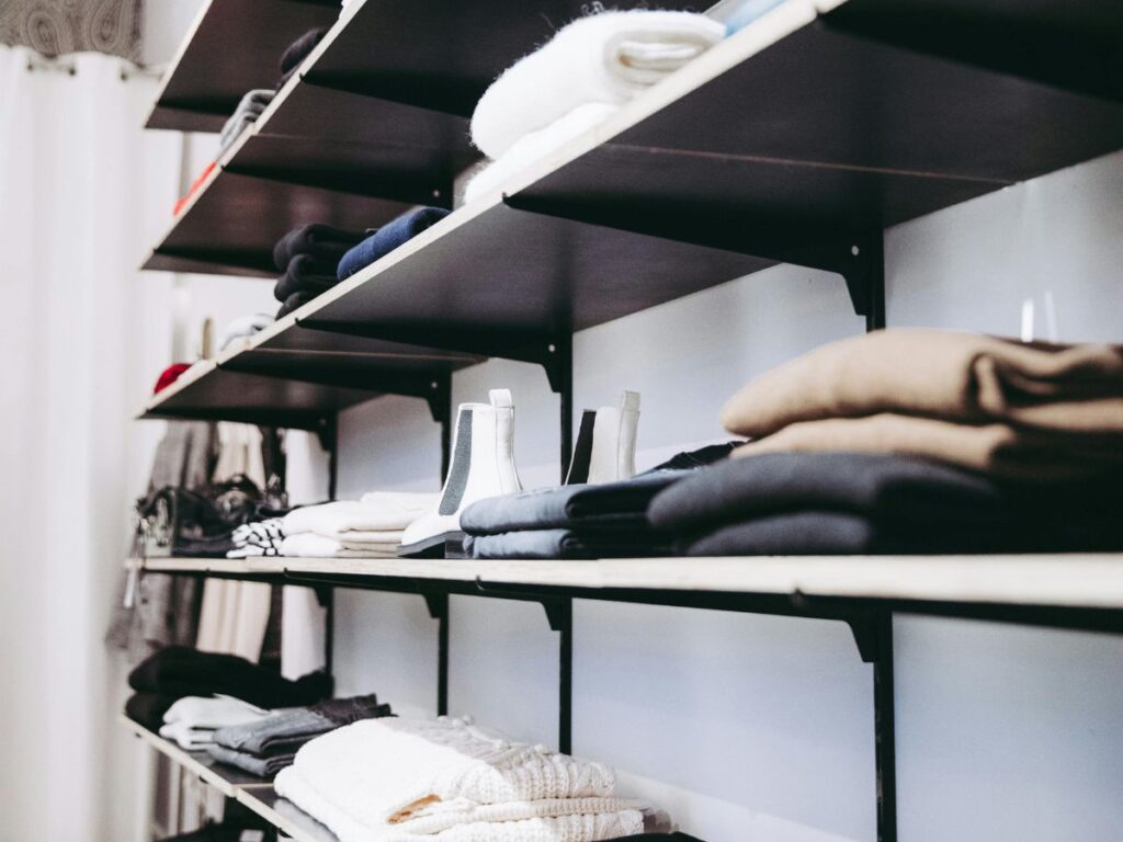 clothes folded in shelves