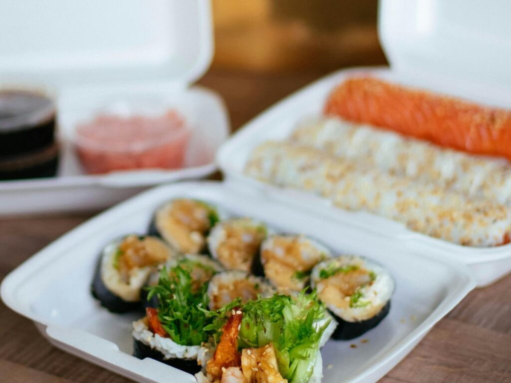 sushi in takeout box