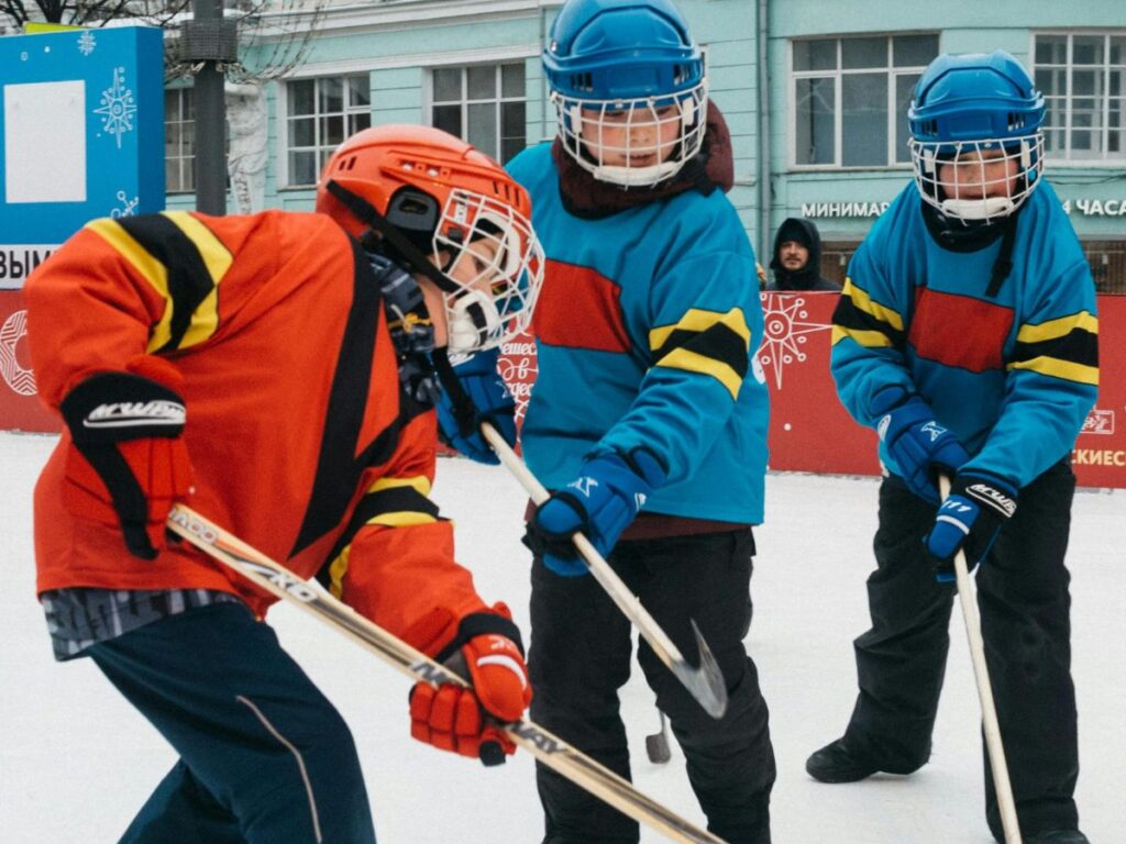 people playing ice hockey