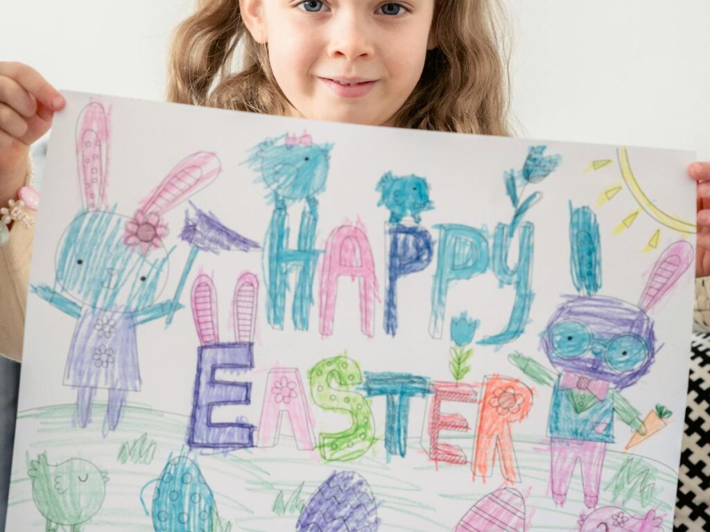 girl holding easter banner