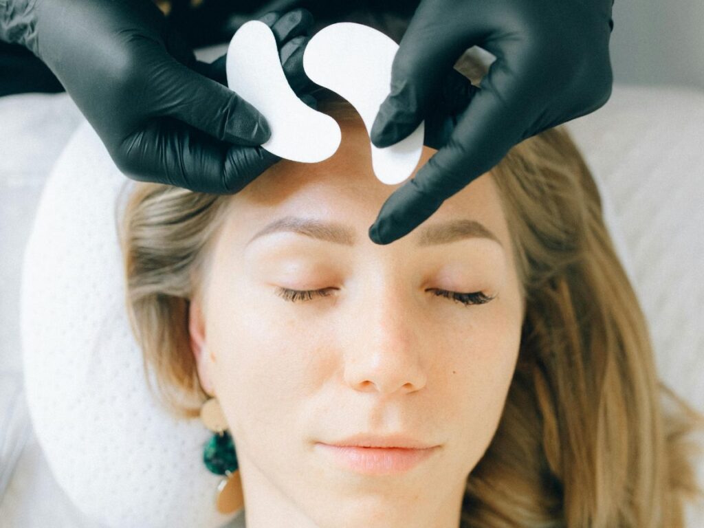 girl getting facial treatment