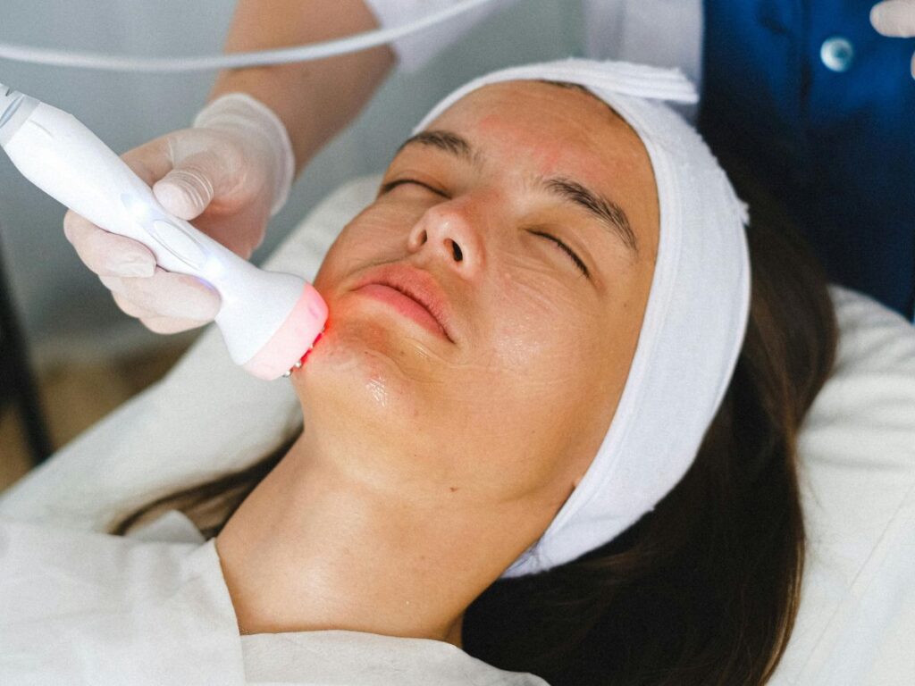 girl getting facial treatment