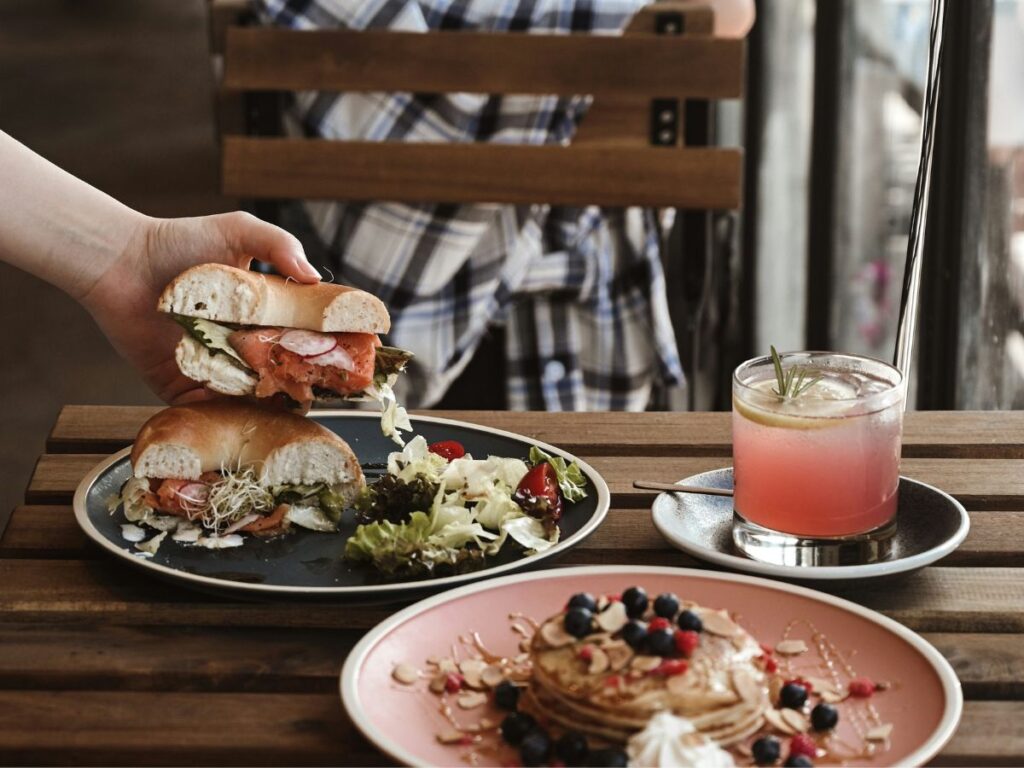 pancake, burger and mojito served in a cafe