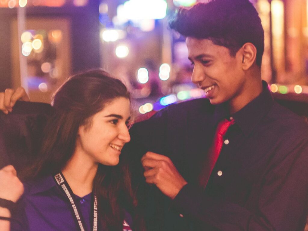 boy hugging girl on a date