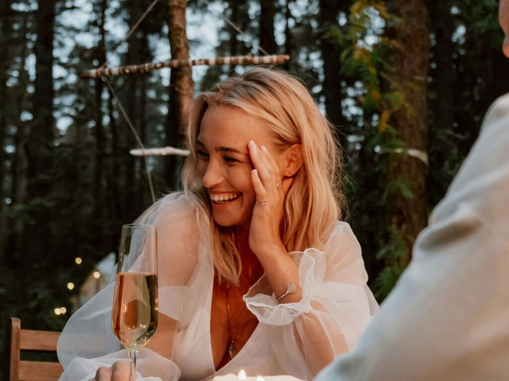 couple having dinner in the woods