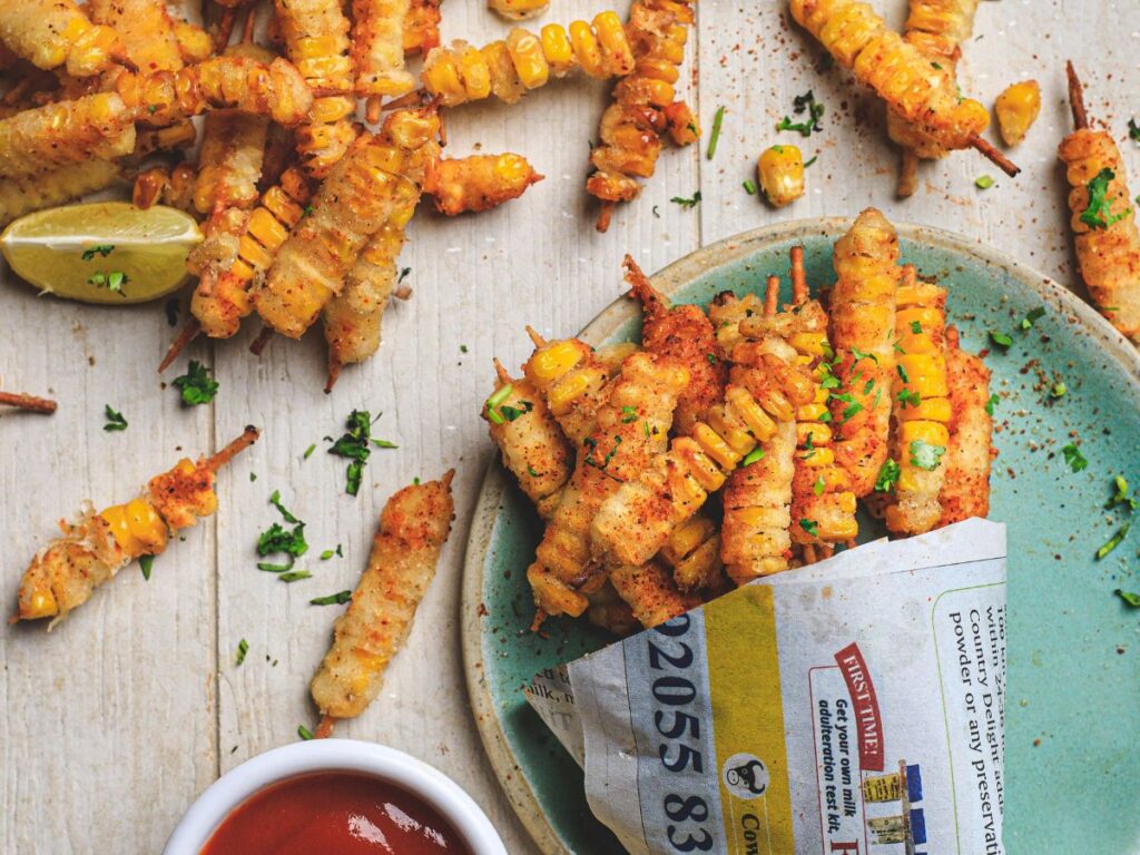 crispy curly fries with masala and ketchup