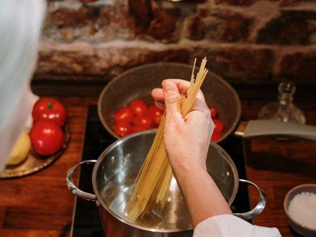 cooking noodles in a hot pot