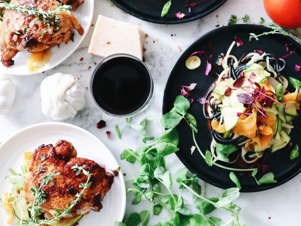 jerk chicken served with other dishes