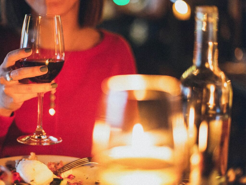 woman drinking in a restaurant