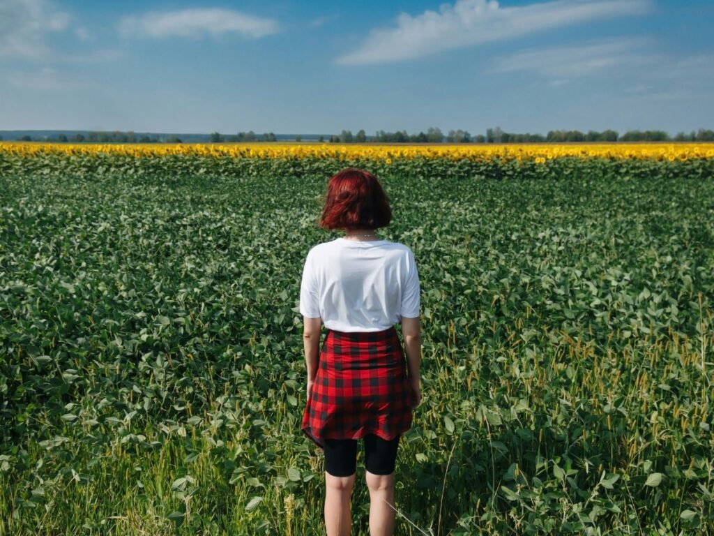 woman standing in the fields