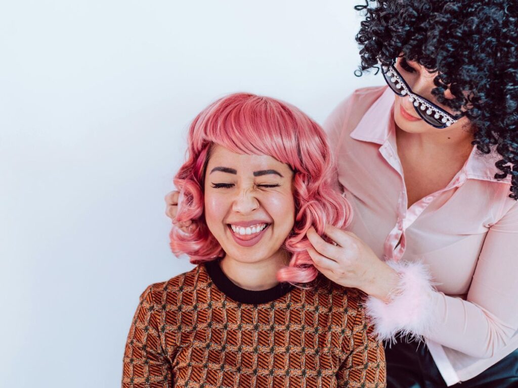 girl trying on a wig