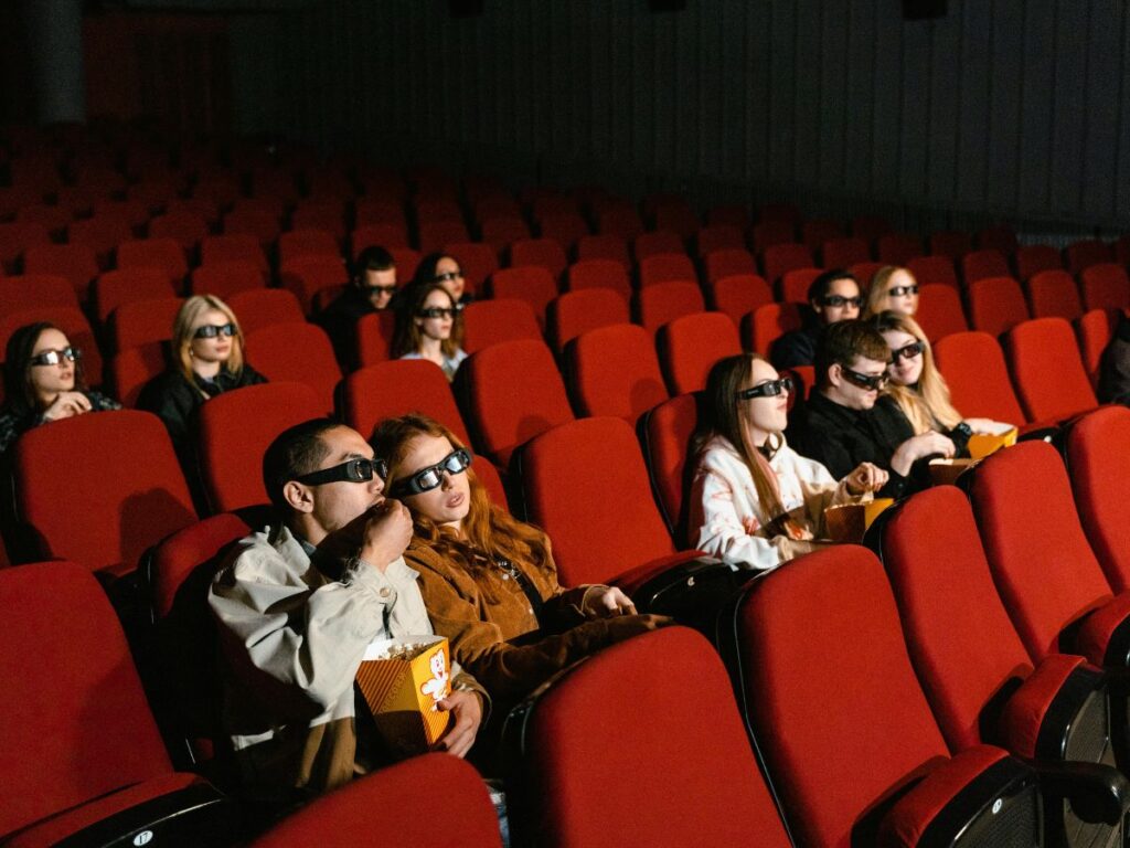 people watching movie in a cinema