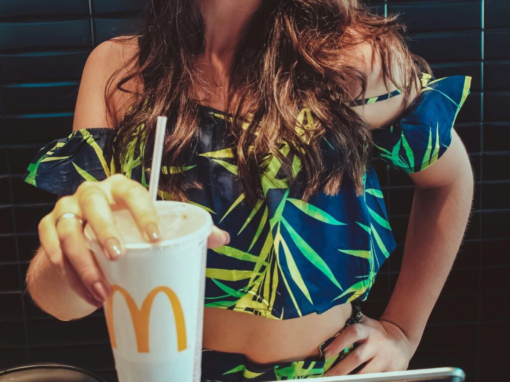 woman drinking Mcdonalds