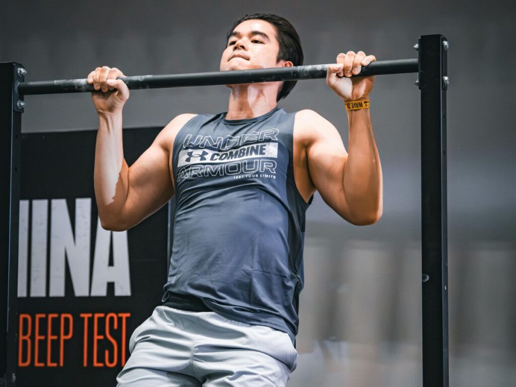 man doing chin ups