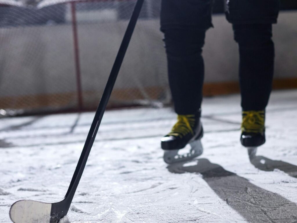 playing ice hockey