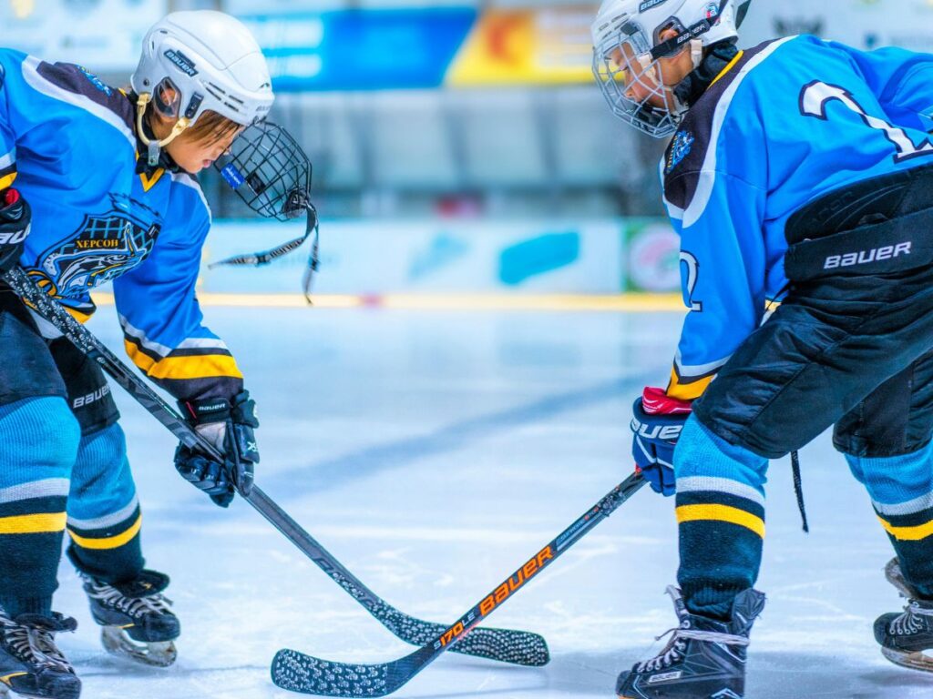 people playing ice hockey