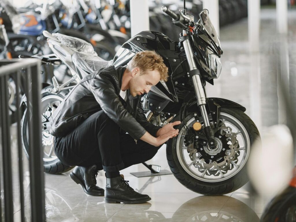 checking a bike in a shop