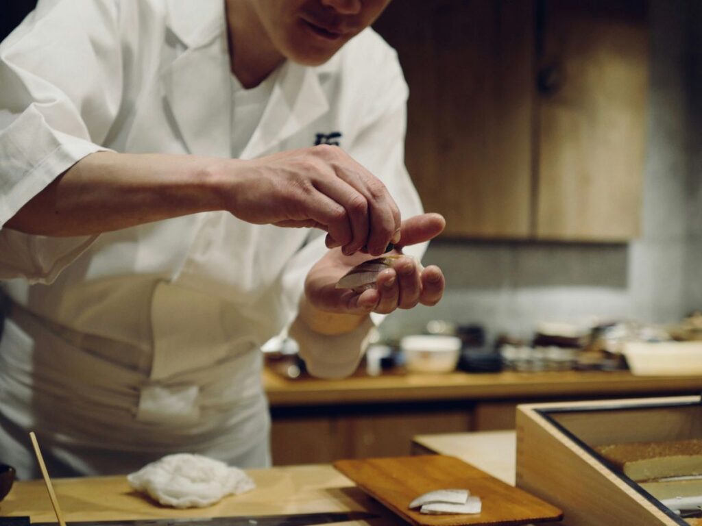 chef making sushi burrito