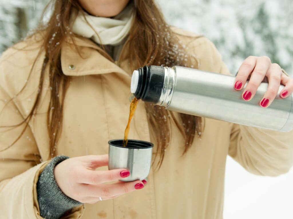 woman pouring coffee