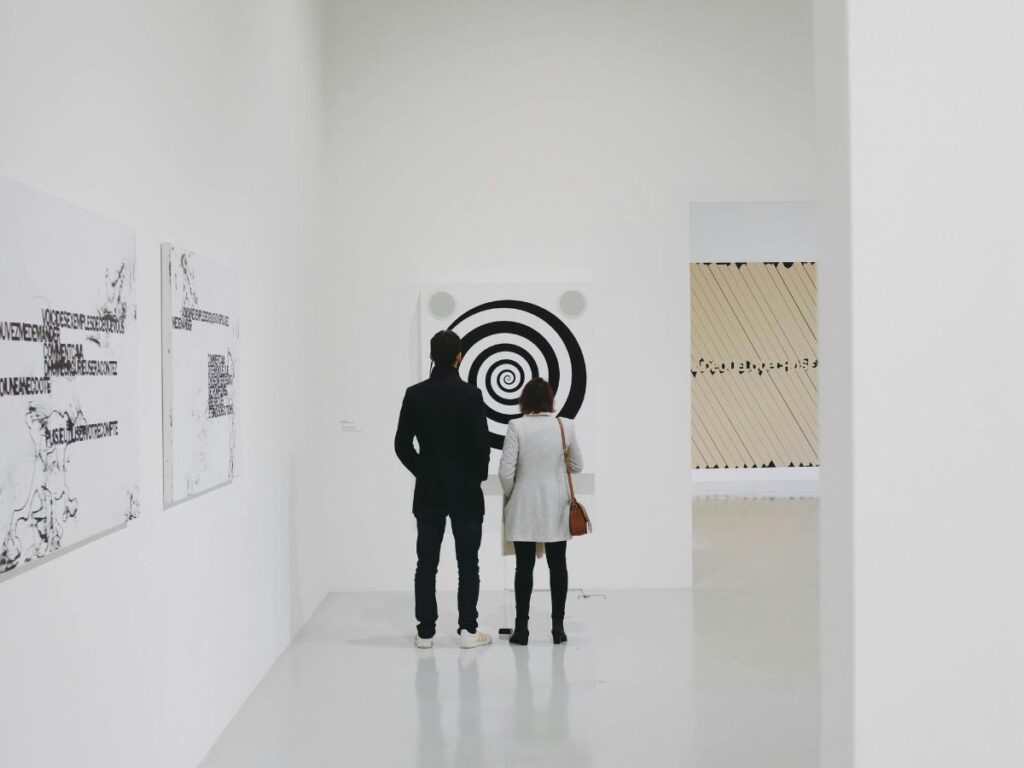 people looking at art in a gallery