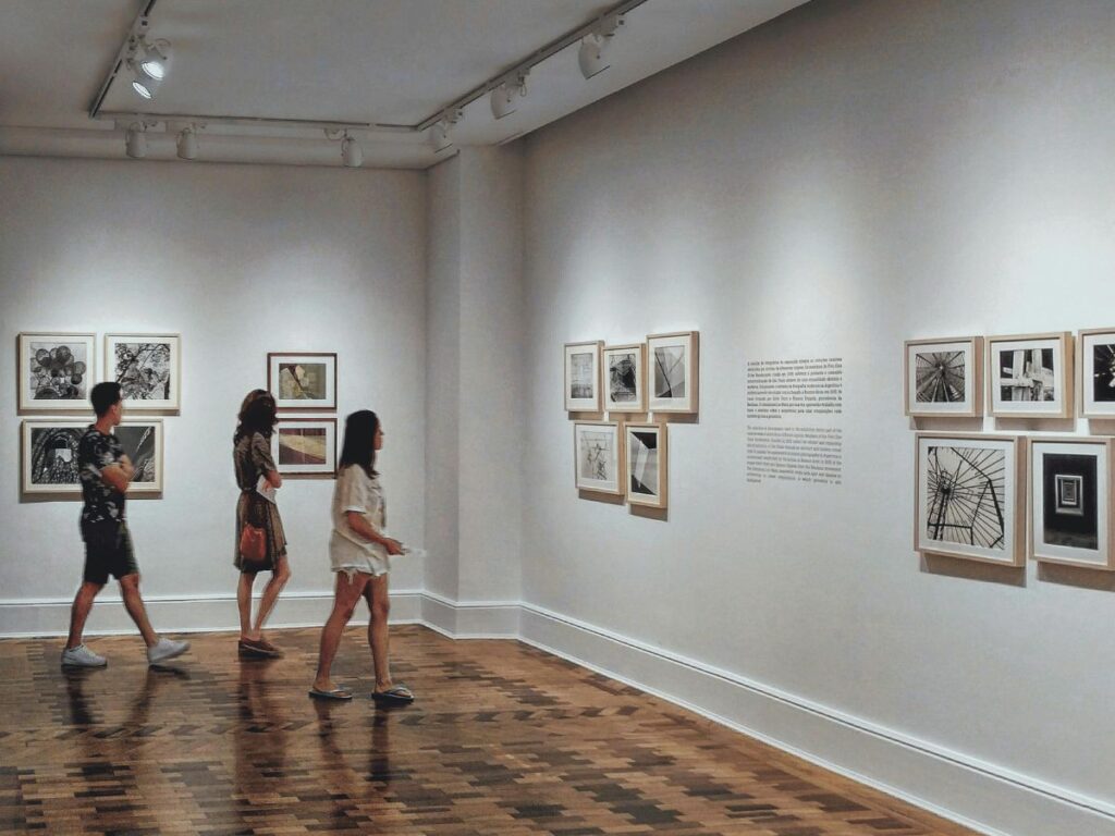 women looking at art in an art gallery