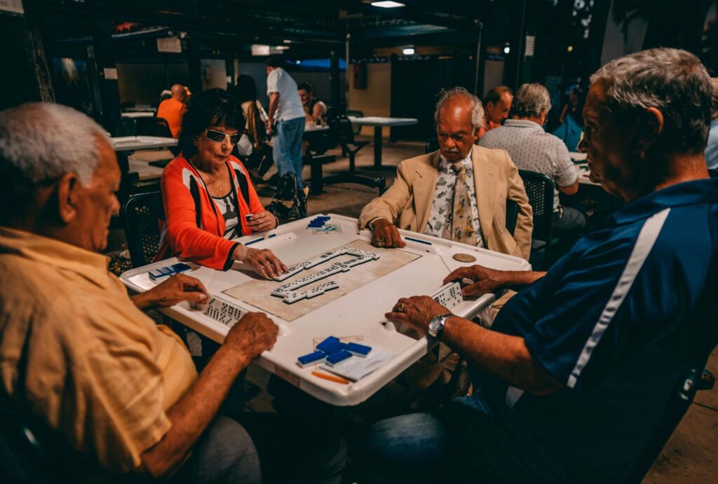 senior citizens playing board game