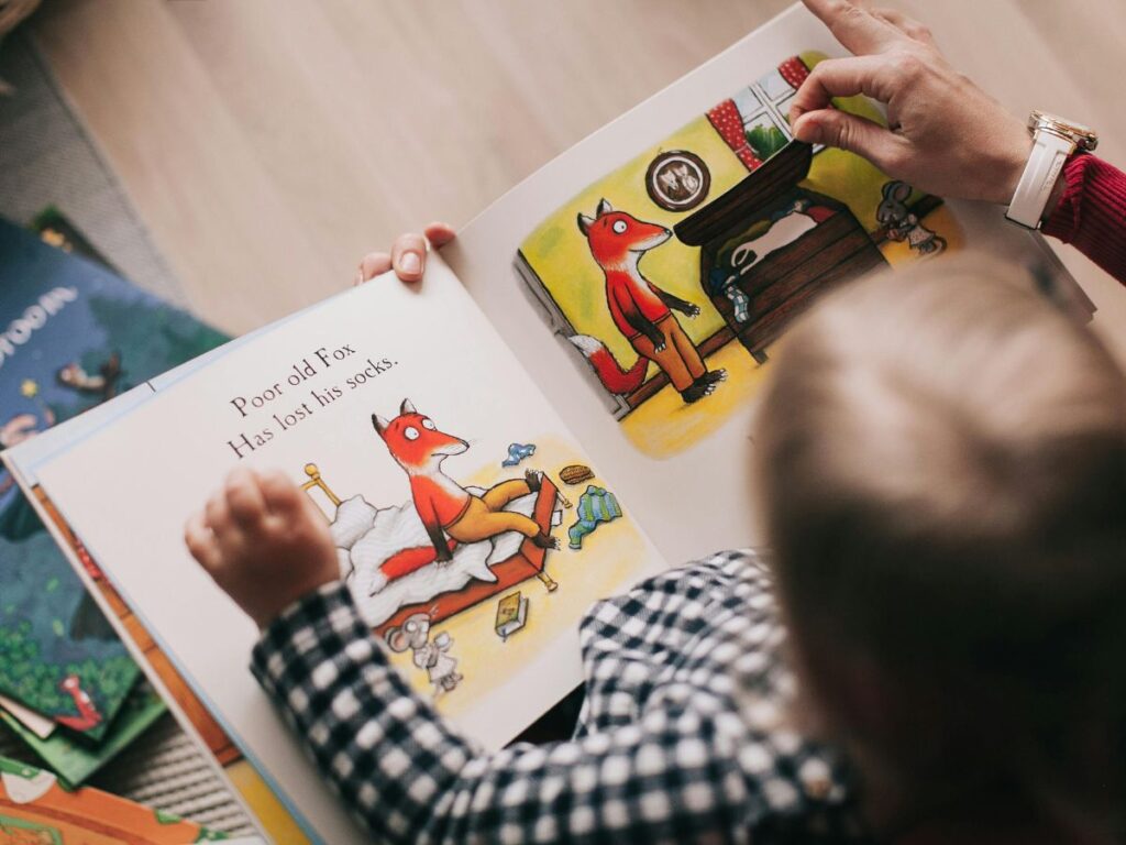 kid reading a book