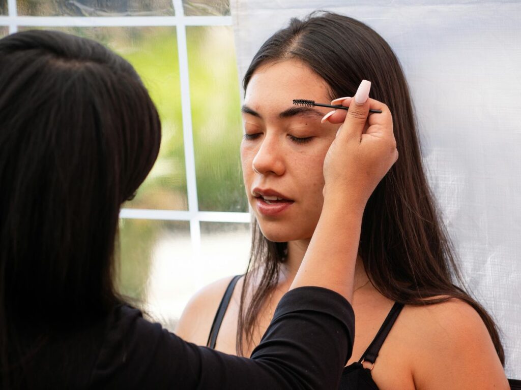 woman getting her eyebrows done